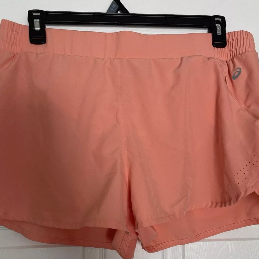Asics running short flat front lined orange XL